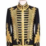 Black military jacket with dense gold embroidery, mandarin collar and matte gold buttons - front view